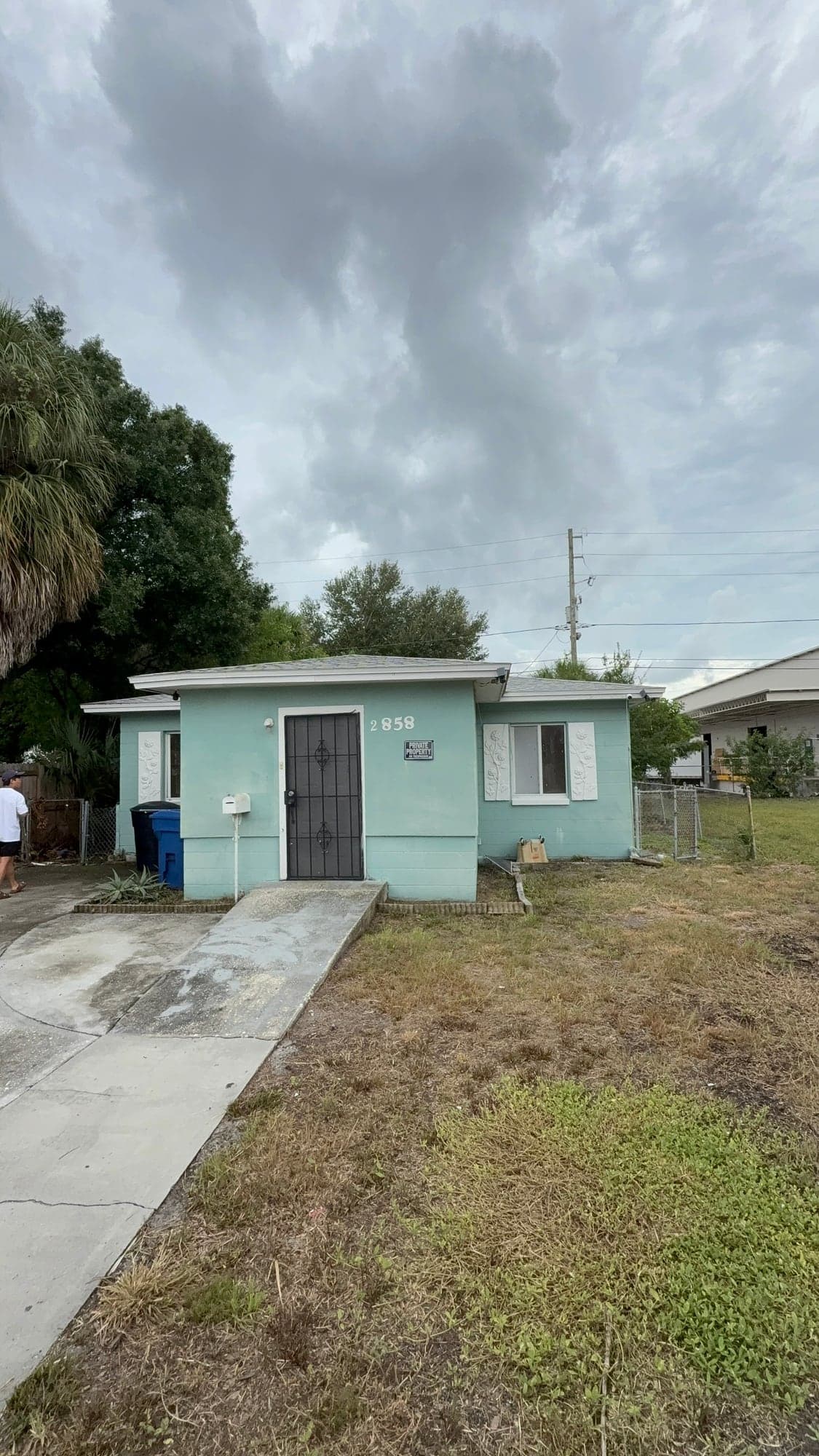 The pale green house at 2858 Fairfield Avenue South in St. Petersburg