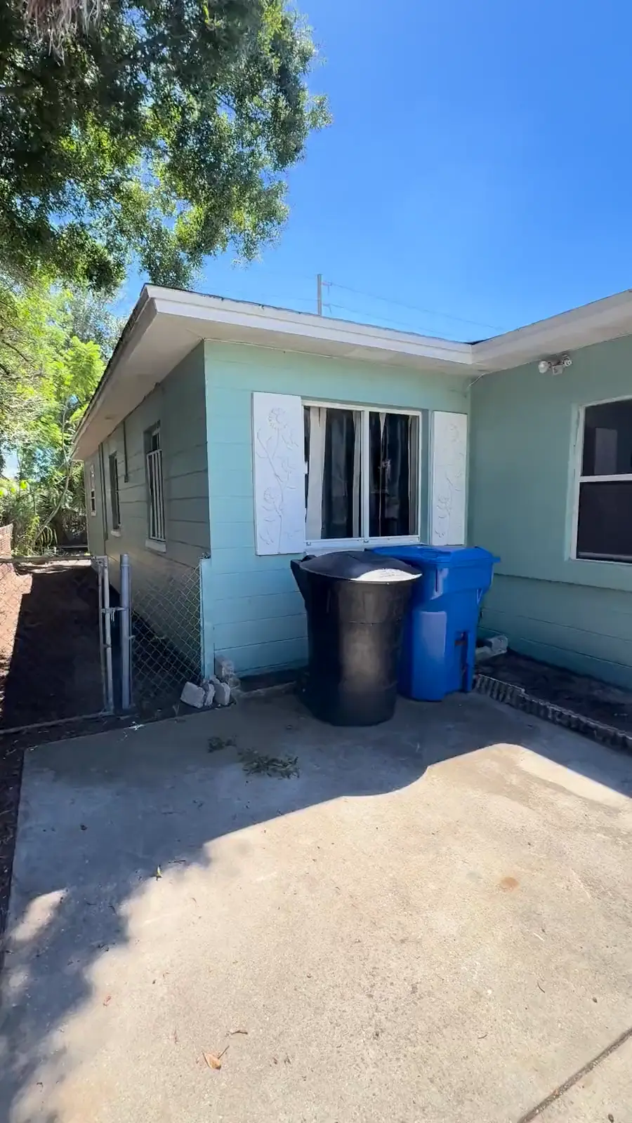 Walking up to the front door of 2858 Fairfield Avenue South in St. Petersburg